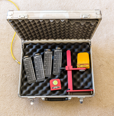 Laser precisely levels pads and measures ride height
